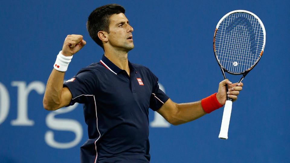 Novak Djokovic memastikan langkah ke semifinal US Open 2014, setelah menyingkirkan Andy Murray 7-6 (1), 6-7, 6-2, 6-4 di New York, AS, Rabu (03/09/14). - INDOSPORT